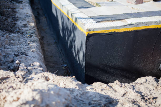 Professional Exterior Waterproofing technician working in Bloomingdale, MI